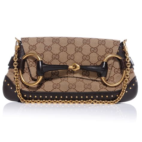 horsebit gucci clutch|gucci monogram horsebit clutch.